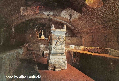 And on the bottom level, the Mithraeum, the cult's main meeting room; the altar depicts the god Mithra killing a bull; members of the cult sat on the benches along the side