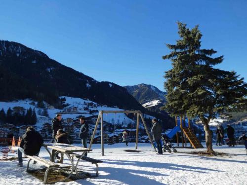 Families catching up in the local playground on Christmas Day
