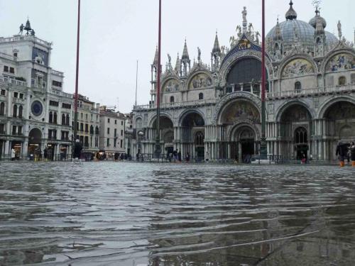 High tides and other factors result in the temporary flooding of low-lying parts of the city 