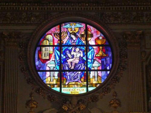 The new stained glass rose window was created in 1995