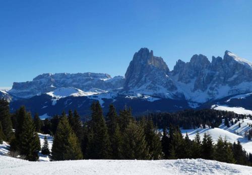 It's surrounded by the Dolomite mountains