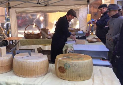 There was a long line to buy the DOP Parmigiano Reggiano 
