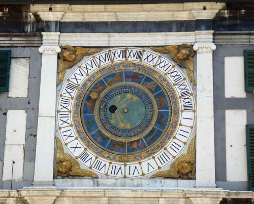 Which shows the phases of the moon and the signs of the Zodiac (and possibly even tells the time?)