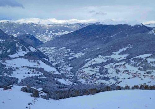 That's Ortisei in the middle of the frame, and Santa Cristina just a bit closer to the camera; the third main town in the valley is Selva (out of shot behind the camera) 