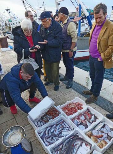 And the townspeople come down to buy their dinner