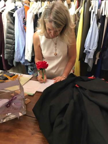 At the dressmaker's, calculations get underway