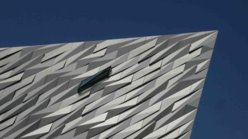 Aluminium panels cover the building's four pointed hulls; it was designed by Texas-born architect, Eric Kunhe