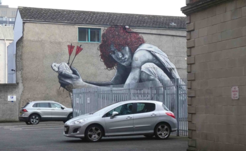 This one, 'Son of Protagoras', shows a dove pierced by two red arrows representing the Protestant and Catholic churches