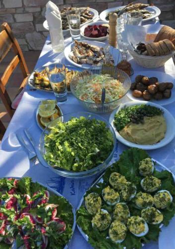 Another day we were invited to lunch at our hosts' home;  again everything on the table - eggs, greens, beans, cabbage, peppers, potatoes ...