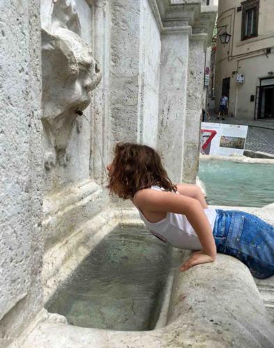 The fountain and clock tower were  were completed in 1748 (this little friend of ours tried out the fountain during a recent visit)