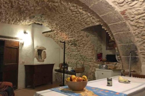 The home of our friends, Franco and Patrizia; this part of the house was originally a grain mill (the bread oven was upstairs); the archway in the middle of the room was built using pre-Roman techniques