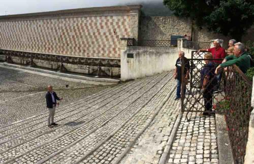 And this is the medieval 'Fountain of 99 Spouts' (L'Aquila was established by the federation of 99 surrounding villages); here's Greg helping a group of Dutch tourists record their visit