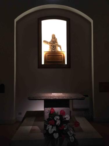 The Pieta in one of the cathedral's chapels; this wooden replica replaced the original 15th century sculpture that was stolen in 1982