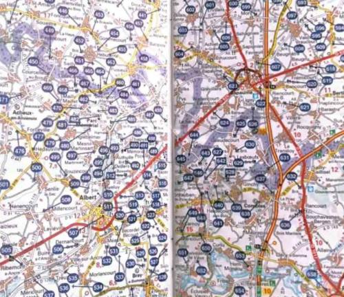As a matter of interest, this is a shot of pages of a street directory for a small part of this area - each blue number is the location of an Allied forces war cemetery; there are literally thousands of war cemeteries in the Somme (for a reference of scale, the distance between the two main towns there - Albert and Bapaume - is 19kms)  