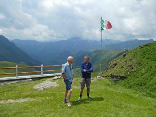 Enrico, on the left, talking to one of the CAI (Club Alpino Italiano) volunteers who staff the hut 
