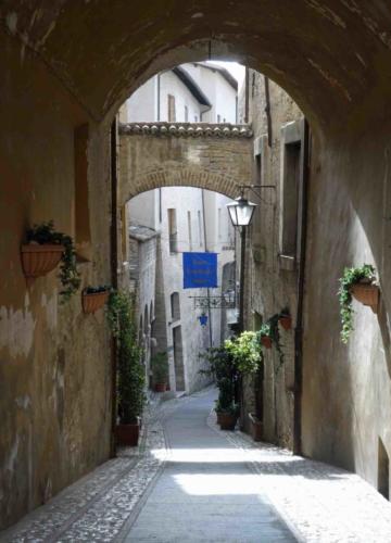 The city is set into the side of a hill, so the streets here are narrow and steep
