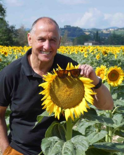 Two lovely, happy faces; and how about the size of that flower?