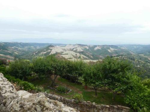 Erosion is clearly evident in the hills and ravines around the village too
