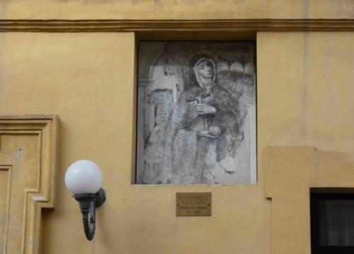 This is St Veronica, the patron saint of photographers (Veronica walked with Jesus as he carried the Cross; she offered her veil to wipe his face and the image of Jesus transferred to the cloth)