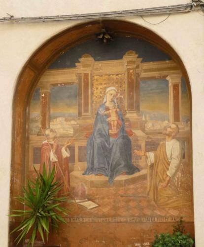 Madonna and Child (fresco above a fountain in the street)
