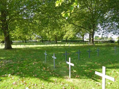 There are also a small number of German war cemeteries scattered around the Somme, but no monuments here, only simple crosses and at least two men per grave