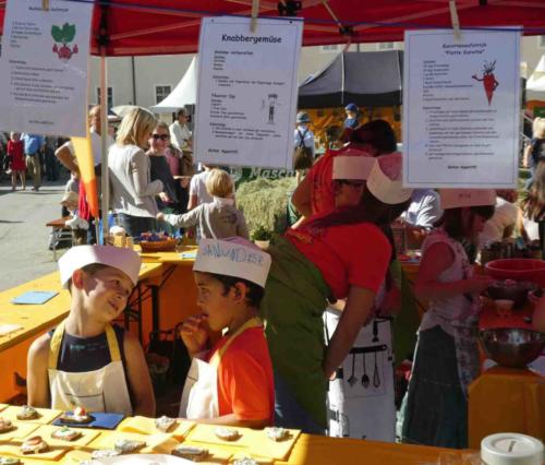 The local kindy fundraiser stall; these little guys were hilarious - 'mate, you're eating the profits!' 