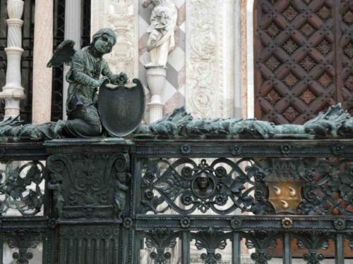 Bartolomeo Colleoni, who boasted his ability to beat anyone in a fight, incorporated his family crest into the gates of the church; the crest includes three roundish shapes that Colleoni liked to think represented his unfailing courage (there's a synonym for Colleoni in Italian that explains this) - the balls on the crest are shiny because apparently people rub them for luck as they enter!