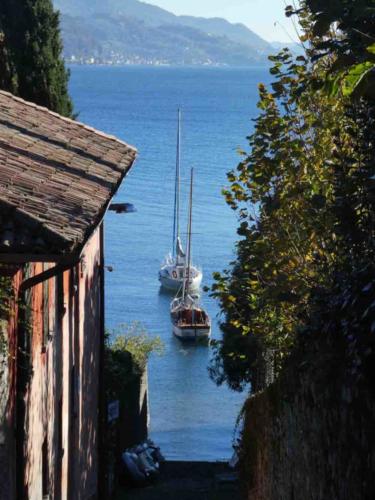 There's a walking path (Salita Cappuccini) that leads up behind Bellagio, over the hill, and down to the water on the other side - it's a steep climb but worth it