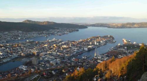 Surrounded by water; most of Bergen is on or close to the fjord