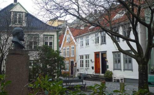 It rains a lot in Bergen, due in part to the mountains that surround the city; but those same mountains also provide protection from blasting northerly winds so the climate here is quite mild