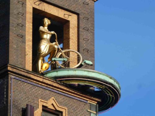 Danes are among the world's most handsome people; they look especially good riding along, elegant coats and scarves flying