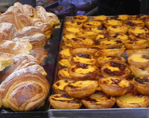 Along here, and on almost every Lisbon street, you'll find pastry shops selling Pastéis de Nata, Portugal's famous egg-custard tarts