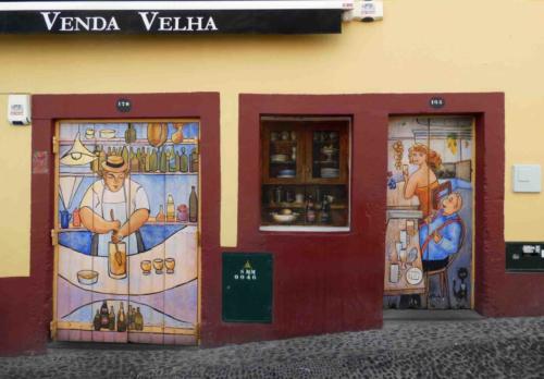 The guy on the left is making Poncha, Madeira's traditional rum-based drink 