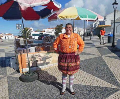 In another part of town this beautiful woman was selling nuts and biscuits; even after we'd completed our purchase she was still pressing new things onto us to try