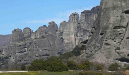 The monks originally climbed up to the caves by wedging planks into holes in the rock face (in much the same way that timber cutters climbed trees)
