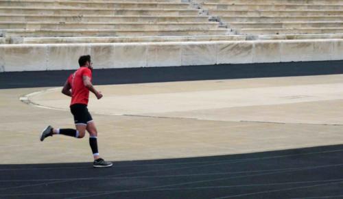 On the day of our visit, plenty of tourists (not us) were taking a slow jog around the track, though this athlete was in full training mode 