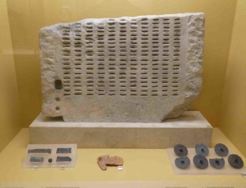An early voting machine, the kleroterion, enabled the random selection of citizens to public office; the bronze tokens were inserted into the slots and a mechanism involving the release of coloured dice determined those who were selected; the klerterion was in use in the 5th century BC - imagine life in the Agora at that time!