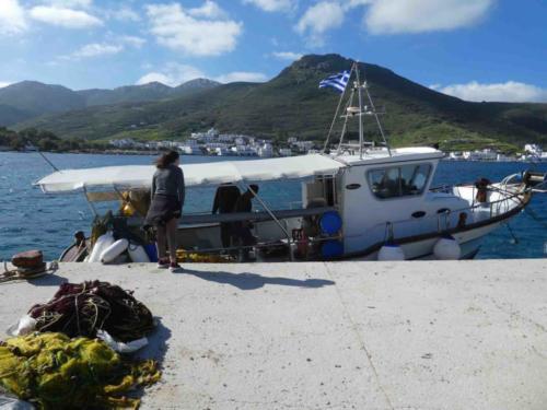 At the dock, Yannis's wife was waiting 