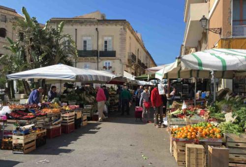 Back on the island and much more visually pleasing is the famous Ortygia market