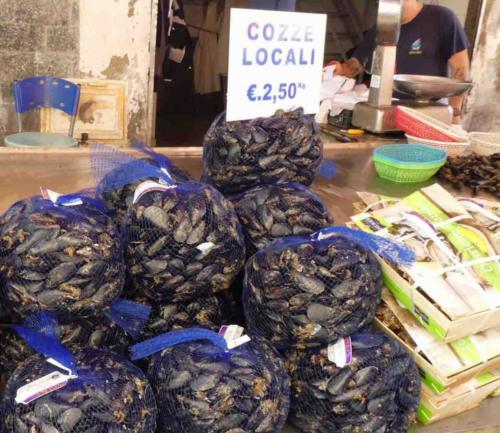 Known for its fresh seafood (especially local tuna and swordfish), we also found the most delicious mozzarella at this market; a big chunk on fresh bread with a squeeze of lemon and a slug of good olive oil ... yum!