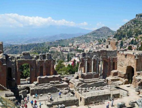 And this is the Greek Theatre in Taormina; the theatre's natural setting, overlooking the coast, the sea and Mt Etna, is spectacular