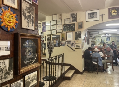 Around the corner, people have been gathering to eat and drink at Osteria del Sole since 1465.