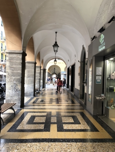 The beautiful arches and intricately designed pavements reminded us a lot of Bologna - the city we're headed to next.