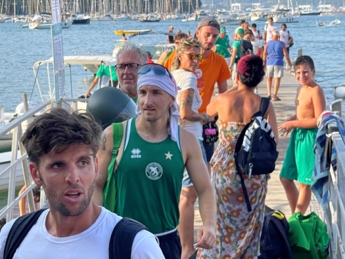 The victorious men return to the adulation of the crowd. :)