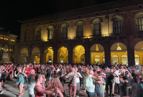 Dance night in Bologna's main square, Piazza Maggiore. Set up a stage, line up the musicians, invite the people - and they will come - in their hundreds.