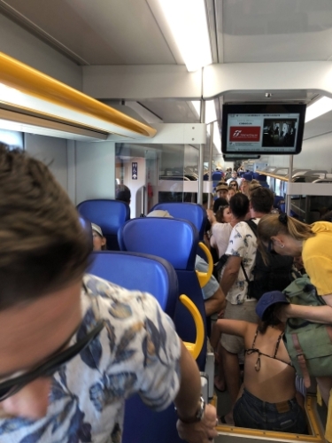 We left the post office and walked to the train station - still clutching our unsent package - only to find it teeming with travellers heading for the famous Cinque Terre villages. A little local knowledge meant we grabbed tickets at the 'bar' on the platform and jumped onto the train before most of the crowd. But by the time we departed, the carriage was stuffed to overflowing.