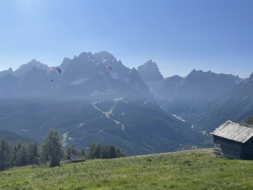Paragliders were launching off the hill behind us and swooping down over the valley below. Watching them took our breath away - we could only imagine what it must have felt like soaring above that magnificent landscape.
