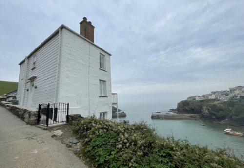 Whether or not it has anything to do with the fame of the village, real estate here is expensive. This house - previously two flats - was sold not long ago for a million pounds. Then the new owner set about doing a complete renovation to turn it into a single home.