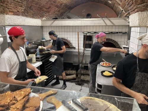 A kind of unleaved bread, farinata is made with only chickpea flour, water, olive oil and salt - cheap and available ingredients. It's what was known as ‘il pane dei poveri' - the bread of the poor - and eaten by generations of Italians in this particular part of Liguria.