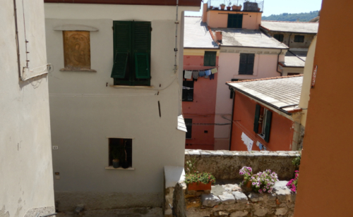 The narrow houses were built into the cliff so they all have two entrances - one facing the sea and another (several floors higher) opening to the street behind
